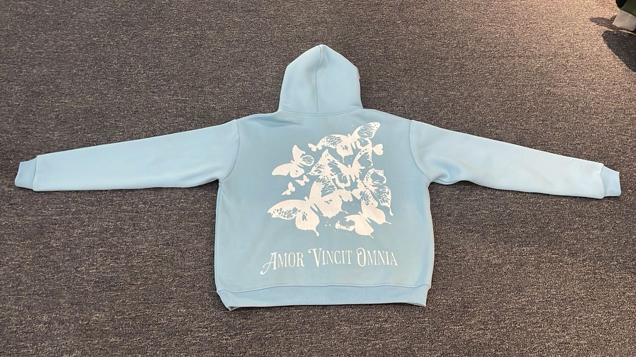 Serado blue unisex Love conquers all ("Amor Vincit Omnia") Hoodie